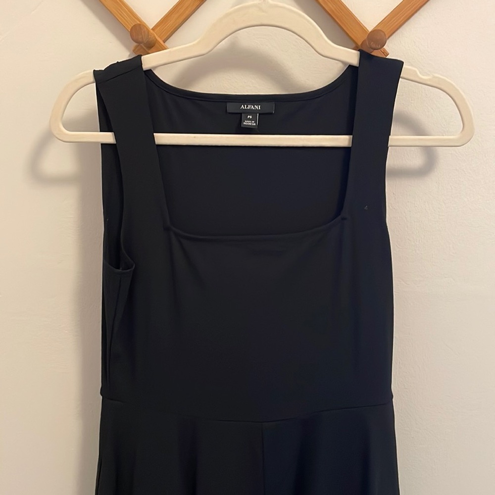 Black dress with full skirt and pockets